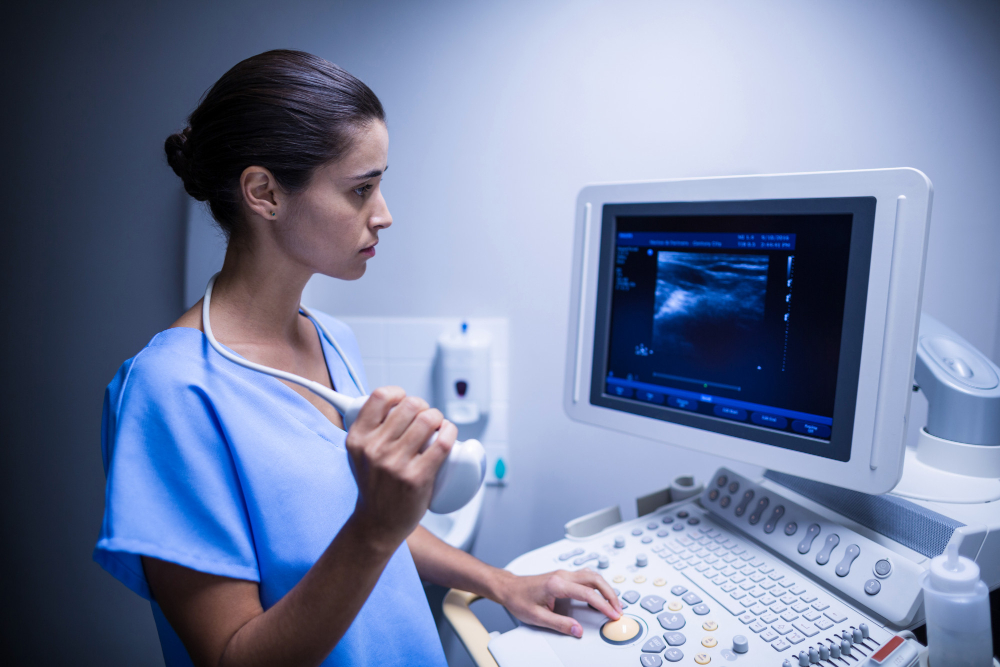 nurse using ultrasonic device